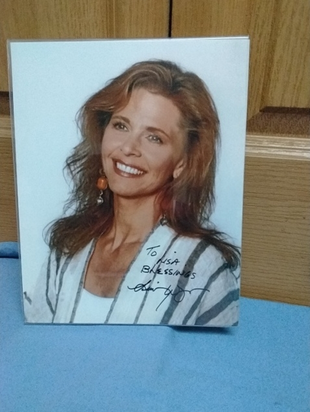 Signed Celebrity Photo with Orange Earrings